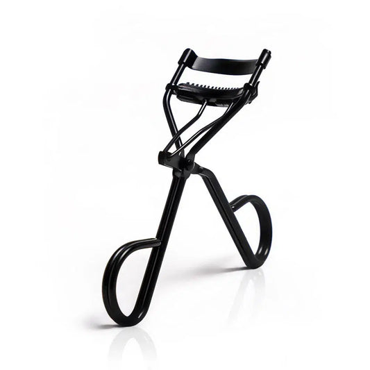 Black Lashy Cosmetics eyelash curler standing upright at an angle.